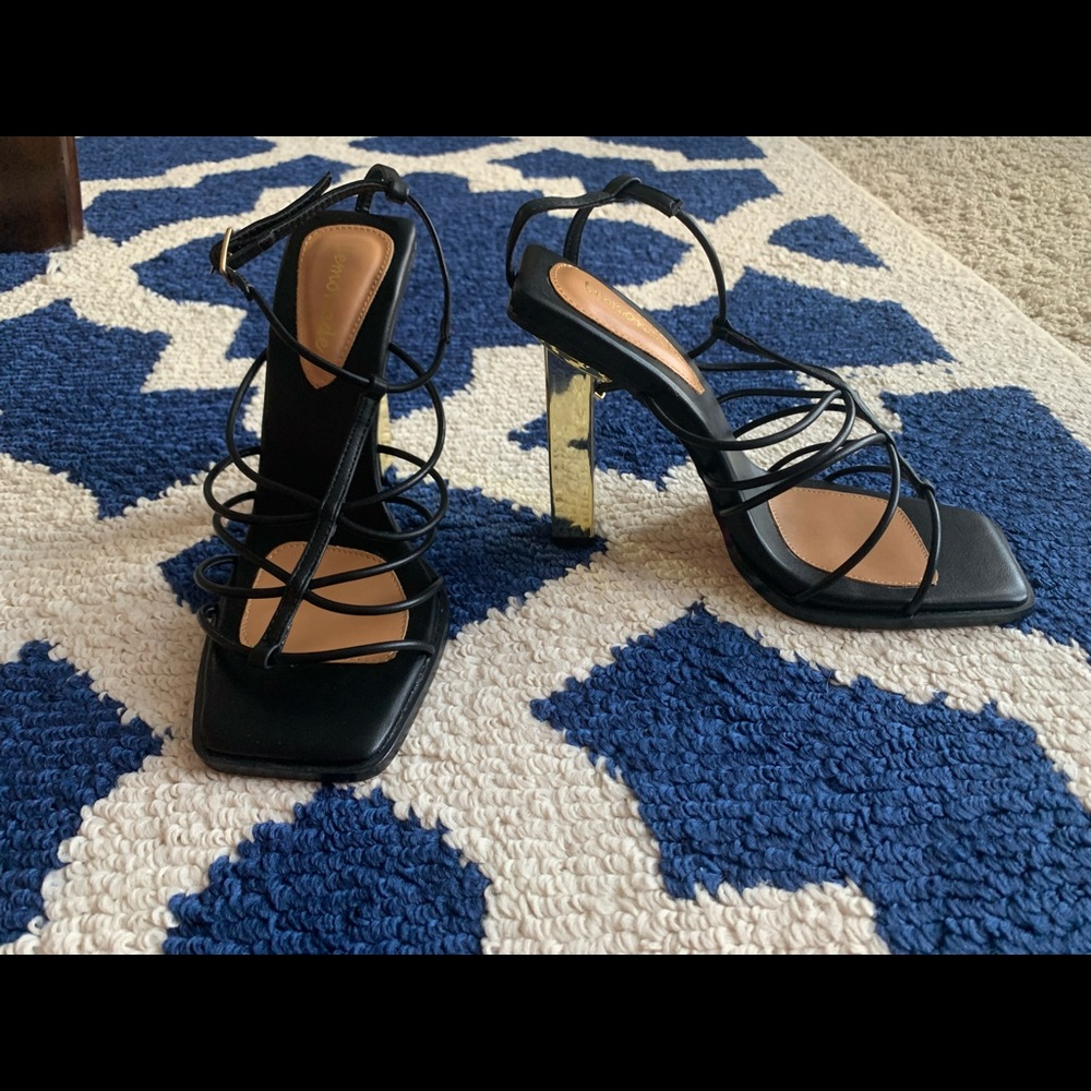 Black sandal with gold heel (never worn)